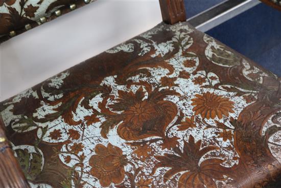 A 17th century style Italian oak open armchair,